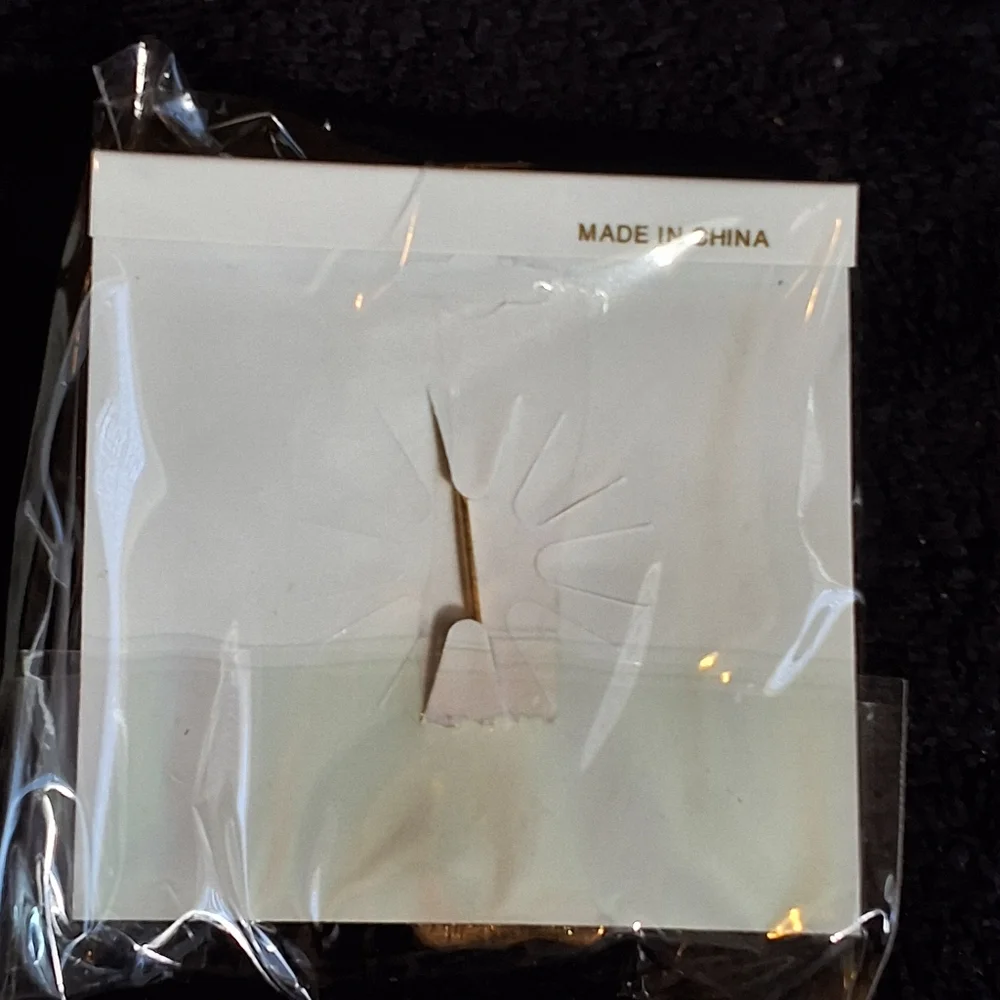NWT ANGEL HOLDING CANDLE